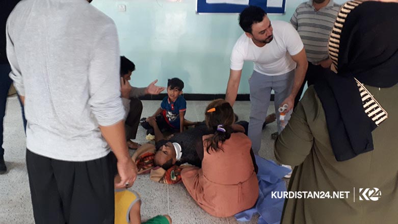 A mini bus carrying two Iraqi tourist families drove off a mountainous road in the Kurdistan Region, killing and injured tens of people  Aug. 30, 2019. (Photo: Kurdistan 24/Karwan Yara)